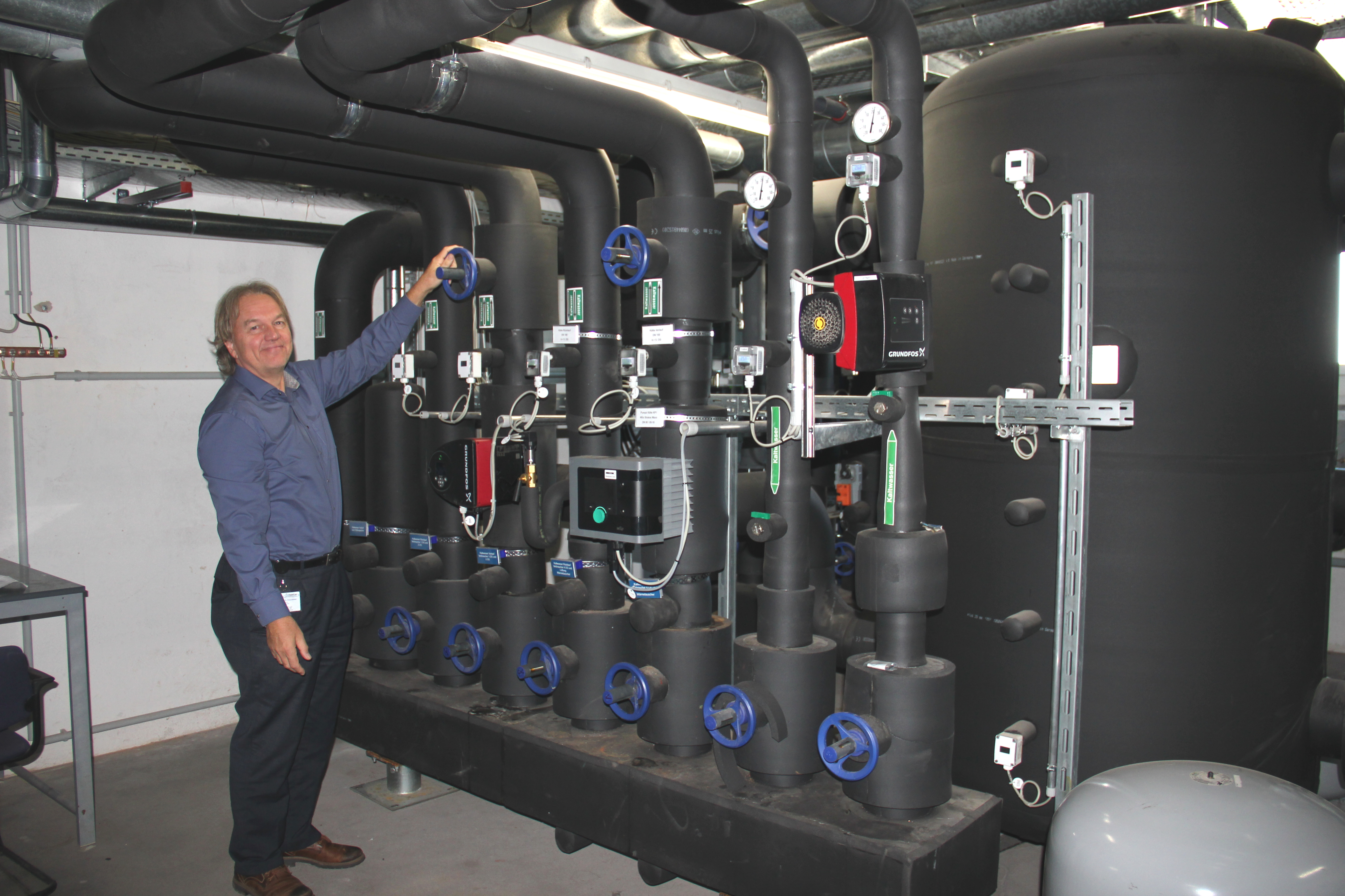 Dr. Peter Gockel in front of the heat exchangers